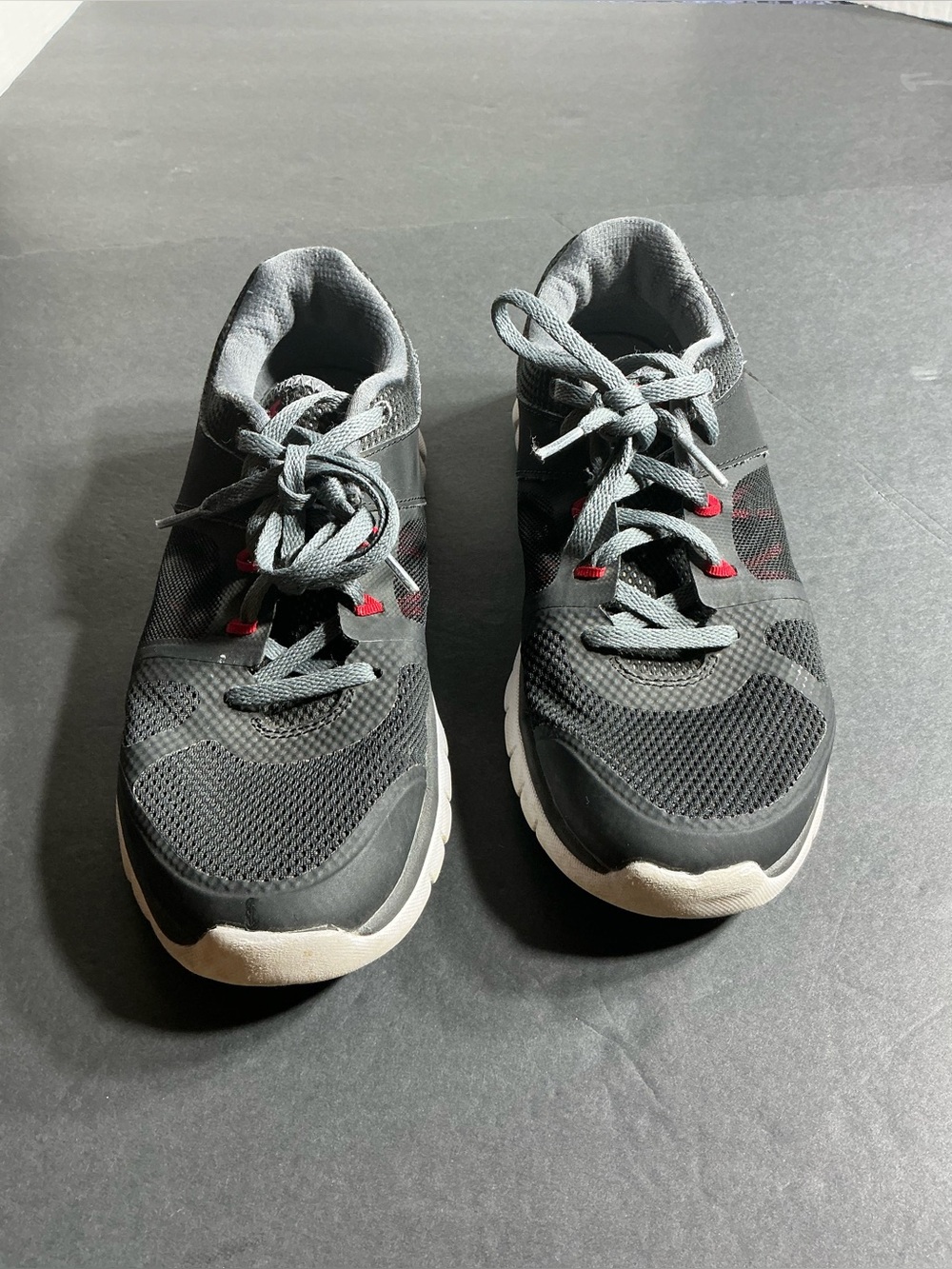 Youth black Athletic Sneakers with Red Accents